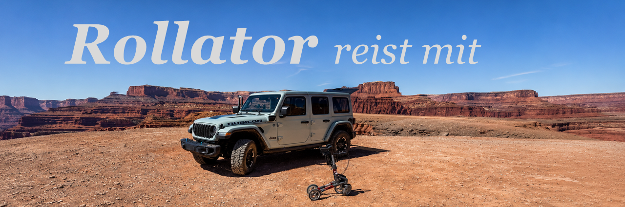 Rollator vor Jeep in Canyonlandschaft Titel "Rollator reist mit"